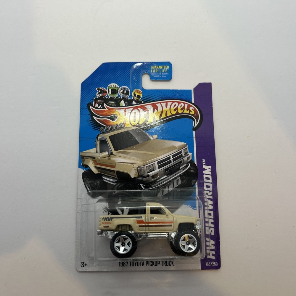 2013 Hot Wheels 1987 Toyota Pickup Truck HW Showroom Beige Carded - Picture 1 of 2